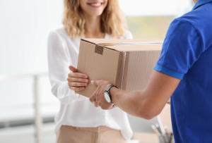 happy woman receiving a parcel