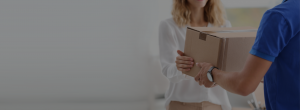 courier delivering package to a woman