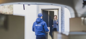 courier completing international package delivery